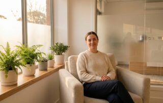 Calm patient relaxing in a modern clinic, reflecting a low hair transplant pain level experience