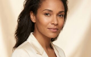 Confident woman showcasing a natural-looking frontal hairline, representing hair transplant for women frontal hairline restoration results.